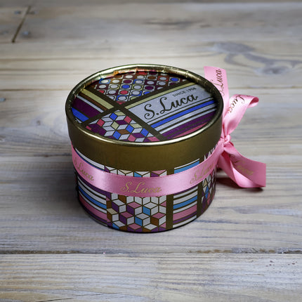 Selection of fine chocolates in a geometric pattern theatre gift box