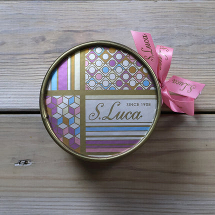 Selection of fine chocolates in a geometric pattern theatre gift box
