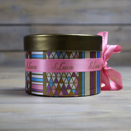 Selection of fine chocolates in a geometric pattern theatre gift box