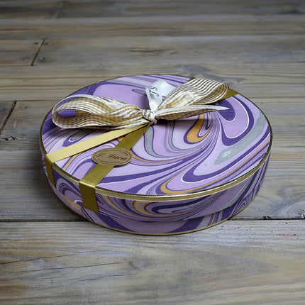 Selection of fine chocolates in a marble pattern theatre gift box