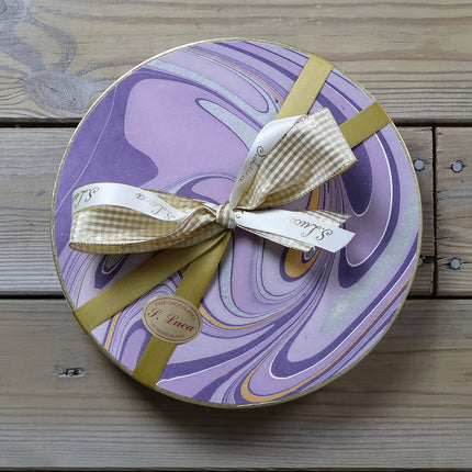 Selection of fine chocolates in a marble pattern theatre gift box