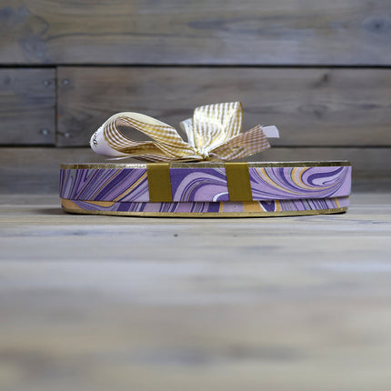 Selection of fine chocolates in a marble pattern theatre gift box