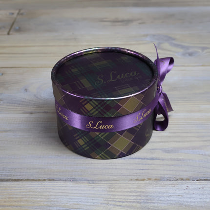 Selection of fine chocolates in a tartan pattern theatre gift box