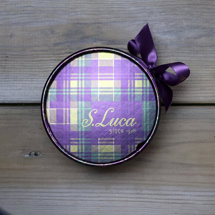 Selection of fine chocolates in a tartan pattern theatre gift box
