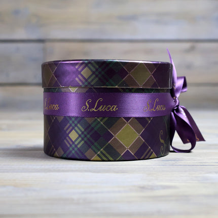 Selection of fine chocolates in a tartan pattern theatre gift box