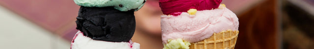 Girl holding multi flavour ice cream cones